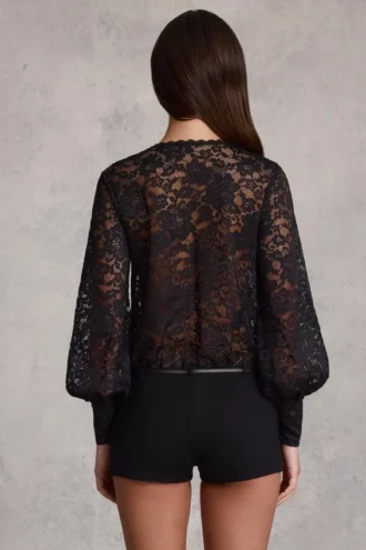 Serenya Sheer Lace Plunge-Neck Loose-Fit Playsuit in Black