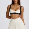 Soft Active Crossover Pleated Mini Skort in Ivory