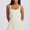 Soft Active Open-Back Pleated Tennis Dress in Ivory
