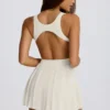 Soft Active Open-Back Pleated Tennis Dress in Ivory