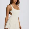 Soft Active Open-Back Pleated Tennis Dress in Ivory
