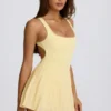 Soft Active Open-Back Pleated Tennis Dress in Lemon
