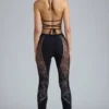 Stevie Embellished Mid-Rise Flared Trousers in Black