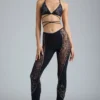Stevie Embellished Mid-Rise Flared Trousers in Black