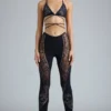 Stevie Embellished Mid-Rise Flared Trousers in Black