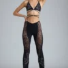 Stevie Embellished Mid-Rise Flared Trousers in Black
