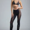 Stevie Embellished Mid-Rise Flared Trousers in Black