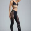 Stevie Embellished Mid-Rise Flared Trousers in Black