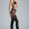 Stevie Embellished Mid-Rise Flared Trousers in Black