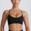 Super Sculpt Seamless Cross-Back Sports Bra in Black