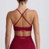 Super Sculpt Seamless Cross-Back Sports Bra in Burgundy