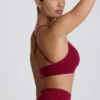 Super Sculpt Seamless Cross-Back Sports Bra in Burgundy