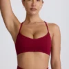 Super Sculpt Seamless Cross-Back Sports Bra in Burgundy