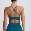 Super Sculpt Seamless Cross-Back Sports Bra in Teal