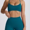 Super Sculpt Seamless Cross-Back Sports Bra in Teal