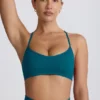 Super Sculpt Seamless Cross-Back Sports Bra in Teal