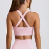 Super Sculpt Seamless Crossback Sports Bra in Powder Pink