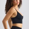 Super Sculpt Seamless Scoop-Neck Sports Bra in Black