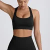 Super Sculpt Seamless T-Back Sports Bra in Black