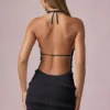 Tarryn Ruffled Backless Halterneck Mini Dress in Black