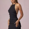 Tarryn Ruffled Backless Halterneck Mini Dress in Black