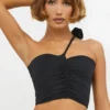 Tesia Slinky Jersey Rose Detail Asymmetric Top in Black