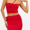 Tesia Slinky Jersey Rose Detail Asymmetric Top in Scarlet Red