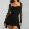 Tivoli Long Sleeve Embellished Cowl Neck Mini Dress in Black