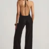 Tulay Devoré Halterneck Open-Back Jumpsuit in Black