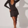 Vallen Plunge Neck Long Sleeve Mini Dress in Black