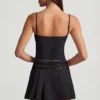 Velora Belted Low-Rise Pleated Mini Skirt in Black