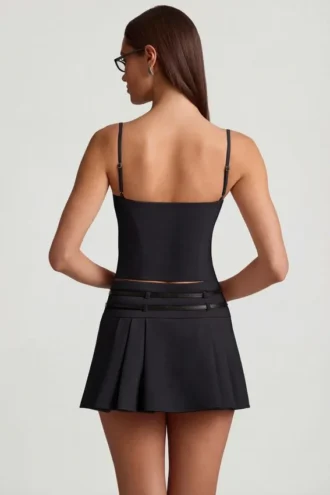 Velora Belted Low-Rise Pleated Mini Skirt in Black
