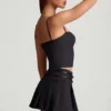 Velora Belted Low-Rise Pleated Mini Skirt in Black