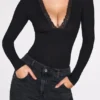 Verity Ribbed Modal Long-Sleeve Plunge Bodysuit in Black